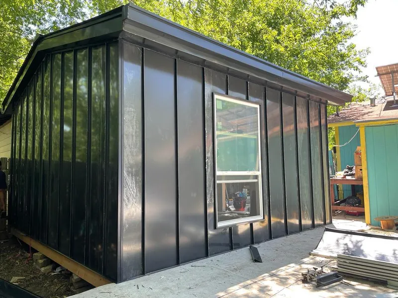 Black standing seam metal wall panels for Metal Roof Installation in Aubrey