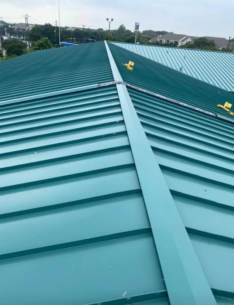 Green commercial metal roof ridge and valley for Metal Roof Repair in Aubrey